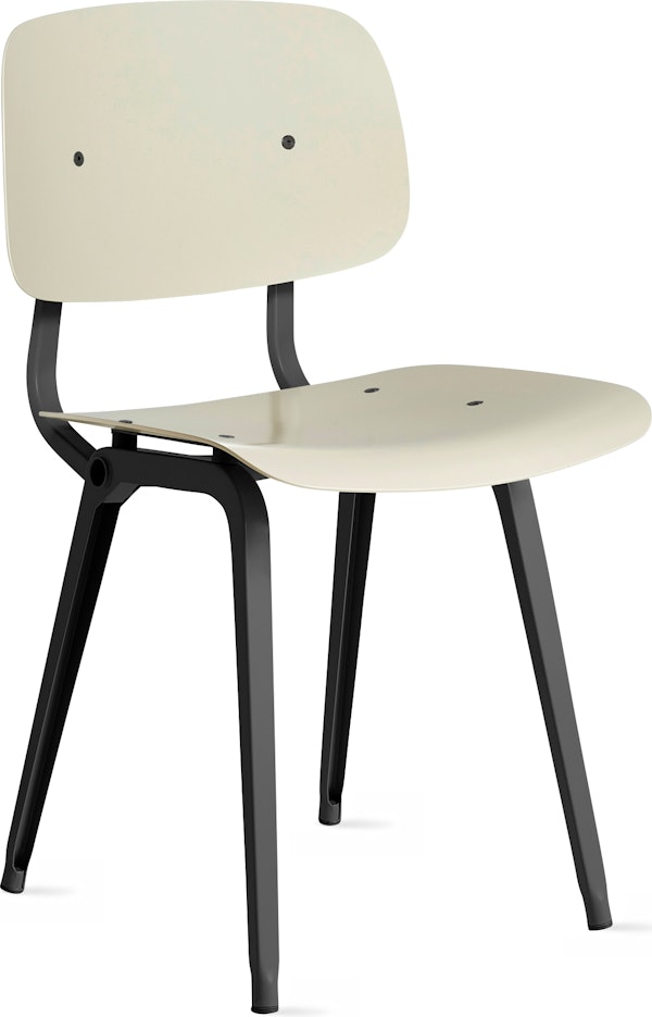 A three quarter side view of a Revolt Chair with a cream seat and back and black frame.